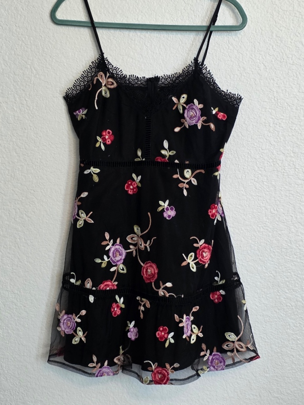 Black dress with embroidered floral dress